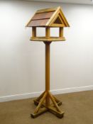 Timber bird table, with tiled rood,