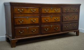 George III mahogany cross banded Lancashire oak dresser, moulded top above nine graduating drawers,