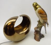 Painted resin and brass model of a Falcon, H42.