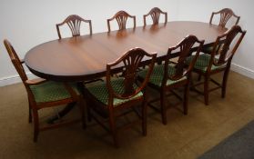 Regency style mahogany twin pedestal extending dining table, out splayed reeded supports,