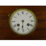 Edwardian French brass cased desk clock with circular Roman dial and visible escapement,