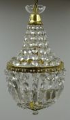 Gilt metal inverted dome form chandelier with faceted glass decoration,