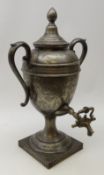 Victorian Britannia metal trophy shaped samovar with all over chased decoration on square base,