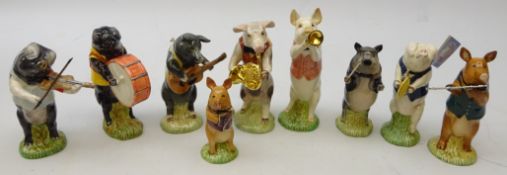 Beswick Pig band, comprising nine figures,