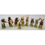 Beswick Pig band, comprising nine figures,