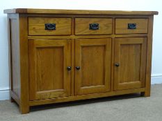 Solid oak sideboard, three drawers above three cupboard doors, W139cm, H87cm,