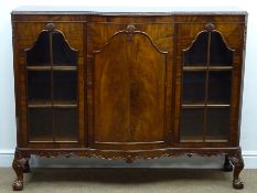 Early 20th century walnut bow breakfront display cabinet,
