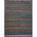 Kilim green ground rug, striped field,