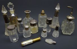 Collection of Victorian and later cut glass scent bottles comprising nine with silver tops or
