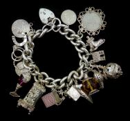 Silver charm bracelet including money box and clock,