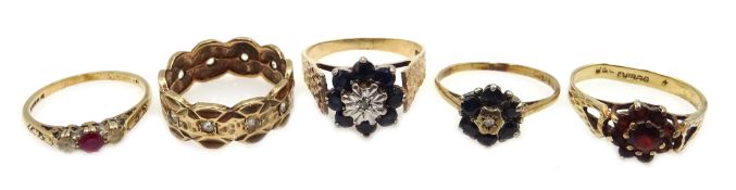 Four 9ct gold stone set rings,