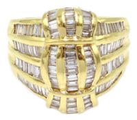 Gold baguette diamond ring, stamped 18K Condition Report Approx 12.