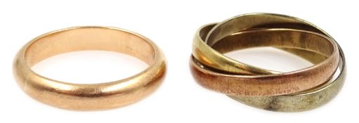 9ct gold wedding band and white and a 9ct yellow and rose gold interlink ring,