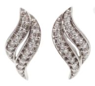 Pair of white gold diamond stud earrings, stamped 18K Condition Report Approx 2.