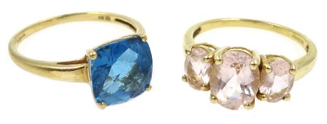 Gold blue topaz ring and gold three stone kunzite ring,