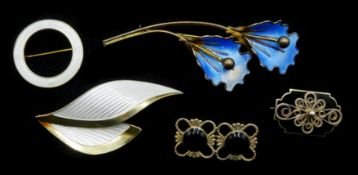 Norwegian silver and enamel brooches including circular and flower spray brooches by Aksel Holmsen,