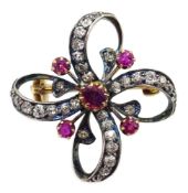 Gold and silver diamond and ruby set ribbon brooch Condition Report Diameter = 25mm