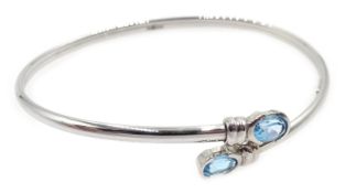White gold blue topaz bangle, hallmarked 9ct Condition Report Approx 3.