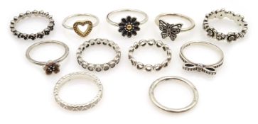 Eleven silver and stone set silver Pandora rings,
