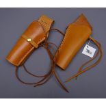 Mexican stitched brown leather cross draw holster and another similar left hand holster,