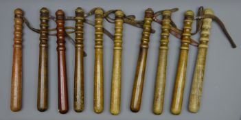 Ten City of London Police turned hardwood Truncheons, some indistinctly stamped,