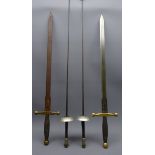 Pair of Replica swords, blades decorated with roundels,