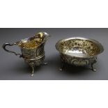 QMAAC interest - an Irish silver sugar bowl repouse with foliage and animals on lions mask paw feet,