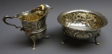 QMAAC interest - an Irish silver sugar bowl repouse with foliage and animals on lions mask paw feet,