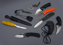 Collection of various knives including Erik Frost Mora woodcarving knife with wooden handle in