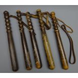 Five City of London Police turned hardwood Truncheons, some indistinctly stamped,