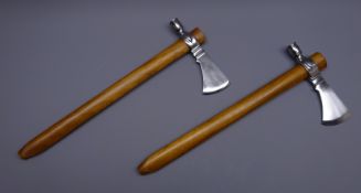 Two Tomahawk Peace pipes, chromed head with hollow wooden shaft,