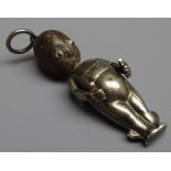 WW1 'Fumsup' good luck charm, silver body, wooden head and glass eyes,