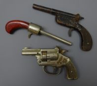 1930s Kenton Texas Revolver type cap gun and two toy Pistol type guns,