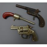 1930s Kenton Texas Revolver type cap gun and two toy Pistol type guns,