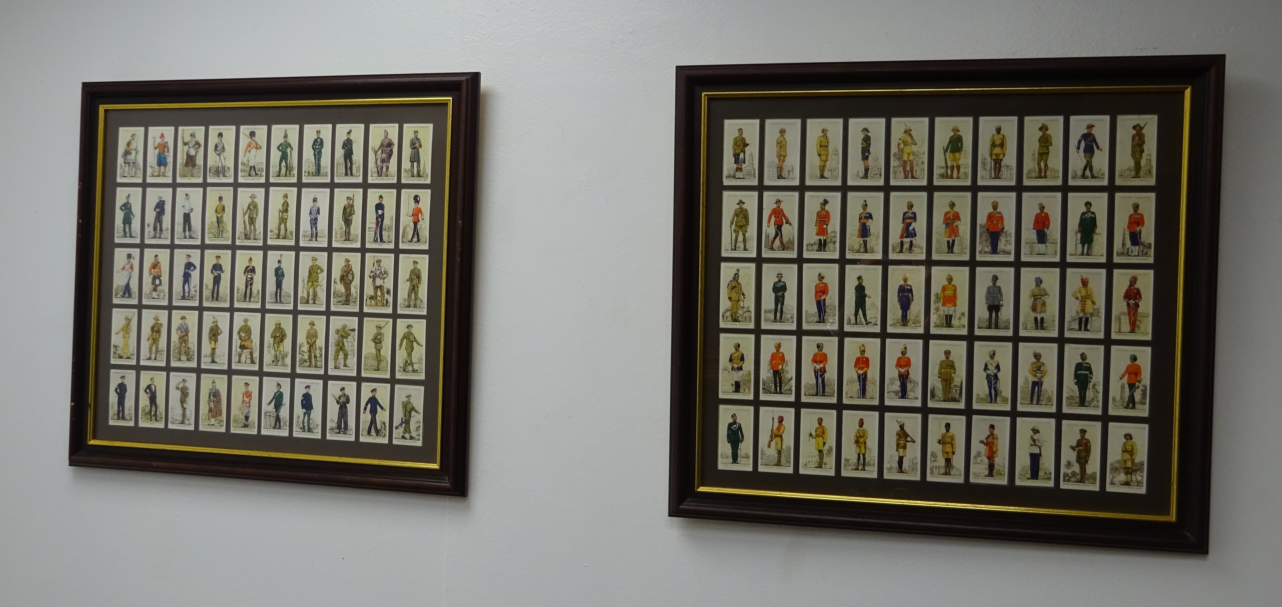 Two sets of fifty John Players military cigarette cards - Uniforms of the Territorial Army and