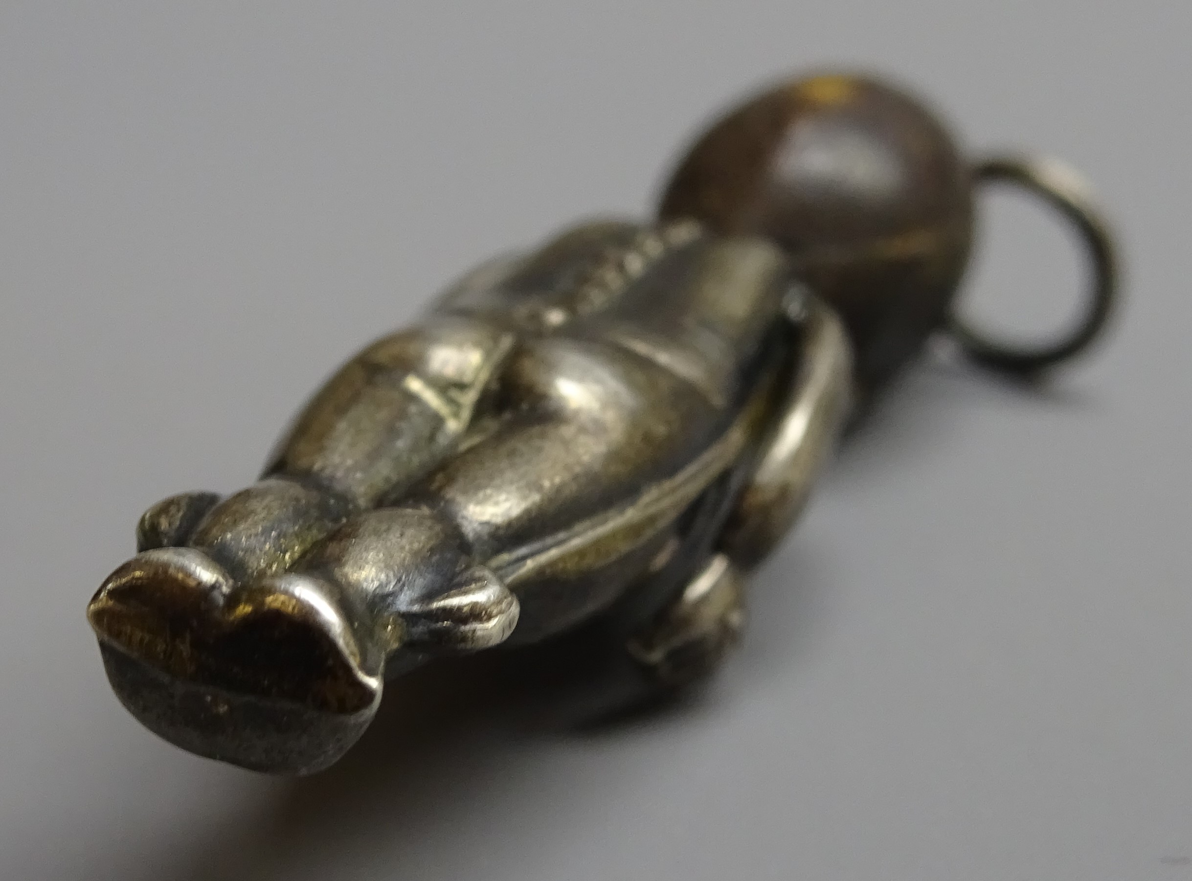 WW1 'Fumsup' good luck charm, silver body, wooden head and glass eyes, - Image 6 of 7