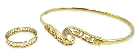 14ct gold key design stone set hinged bangle and a gold key design ring,