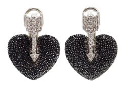 Pair of Cupid black and white diamond stud earrings,