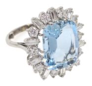 White gold emerald cut aquamarine ring, with alternate round and baguette diamond surround,