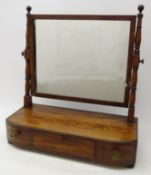 Georgian mahogany toilet mirror, rectangular plate above one long and two short drawer base,