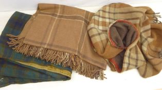 Early 20th century tartan patterned motoring rug with metal neck fitting collar and indistinct