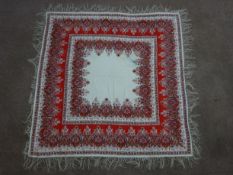19th century cotton Paisley shawl, cream ground with boteh borders and fringing,