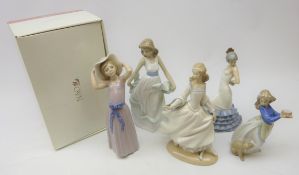 Two Lladro figures: Cinderella 4828 and girl in hat with three Nao figures (5) Condition