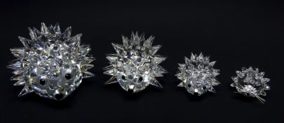 Set of four graduated Swarovski Crystal Hedgehogs,