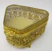 French gilt metal jewellery casket with pierced sides and bevelled glass top on four scroll feet,