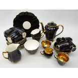 1950's Wade black and gilt coffee service comprising coffee pot, five cups, six saucers,
