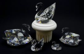 Swarovski 1995 Centenary Swan on stand and four graduated Swans,