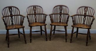 Set four 19th century ash and elm low back Windsor armchair, pierced splat and stick back,