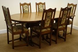 Old Charm oval oak extending table, moulded top, two turned supports joined by single stretcher,