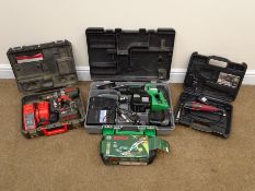 Hitachi Koki DH250ALcordless rotary hammer drill, a Milwaukee C18 PD cordless drill and charger,